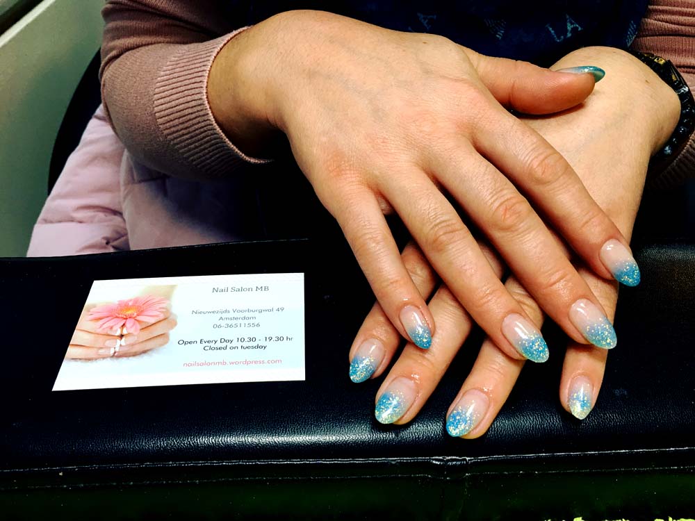 Artificial Nails With Natural Tips And Blue Glitter Nail Salon Mb